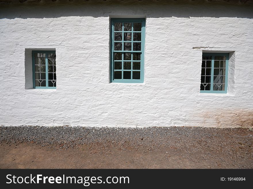 Chapel wall whitewashed with three windows. Chapel wall whitewashed with three windows