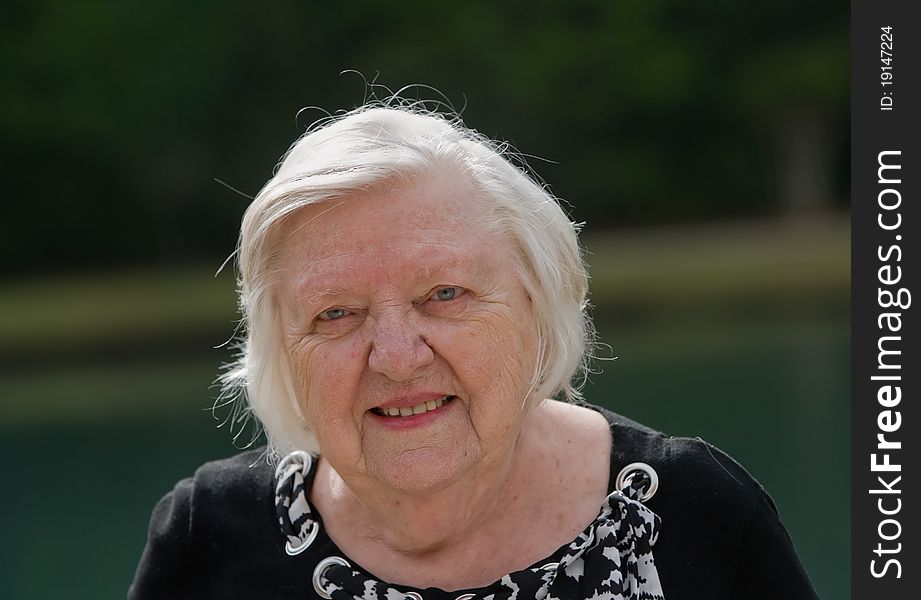 Portrait of old woman outside during day. Portrait of old woman outside during day