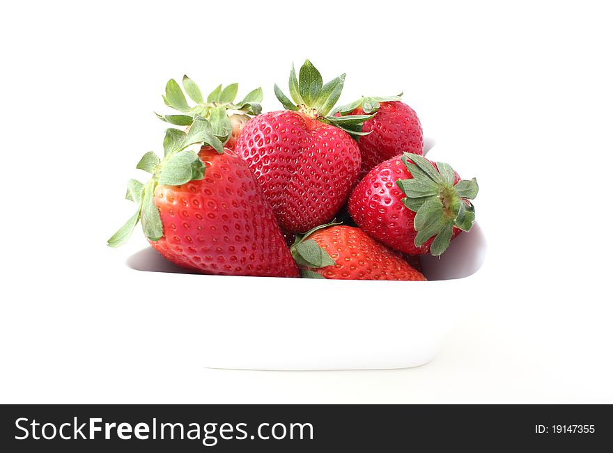 Strawberries In A White Bowl