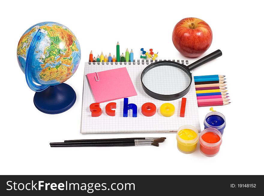 The globe with pencils isolated on a white background