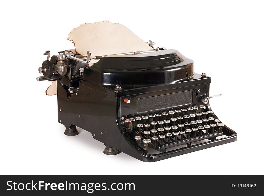 Old typewriter isolated on white