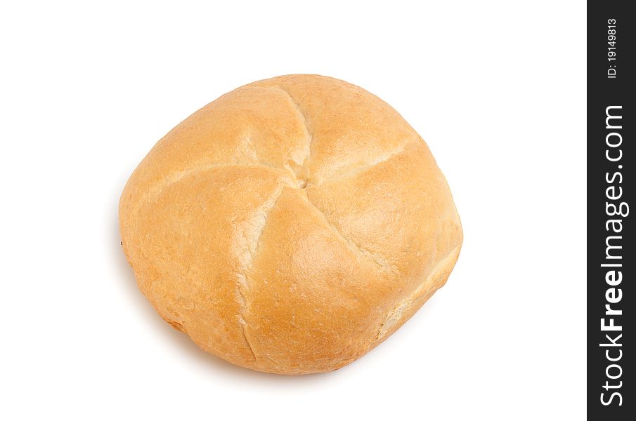 Freshly baked kaiser bun on a white background