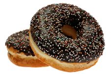 Two Chocolate Donuts With Sprinkles Royalty Free Stock Photos