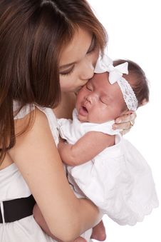 Kissing Her Baby Royalty Free Stock Photography Kissing Her Baby Royalty Free Stock Photography