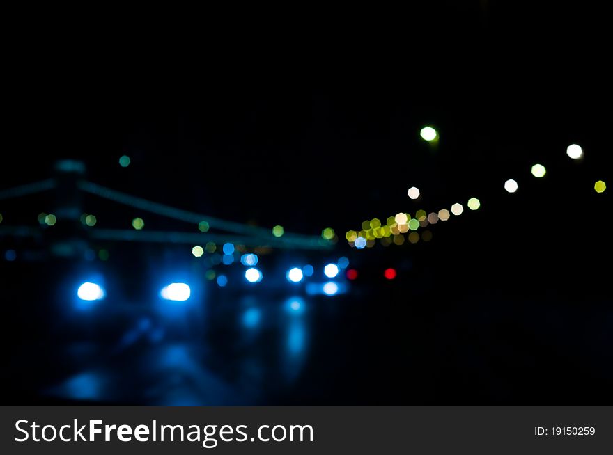 Out of focus lights of traffic and city at night