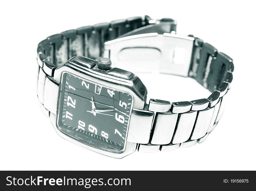 Broken wrist watch with cracked screen on a white background