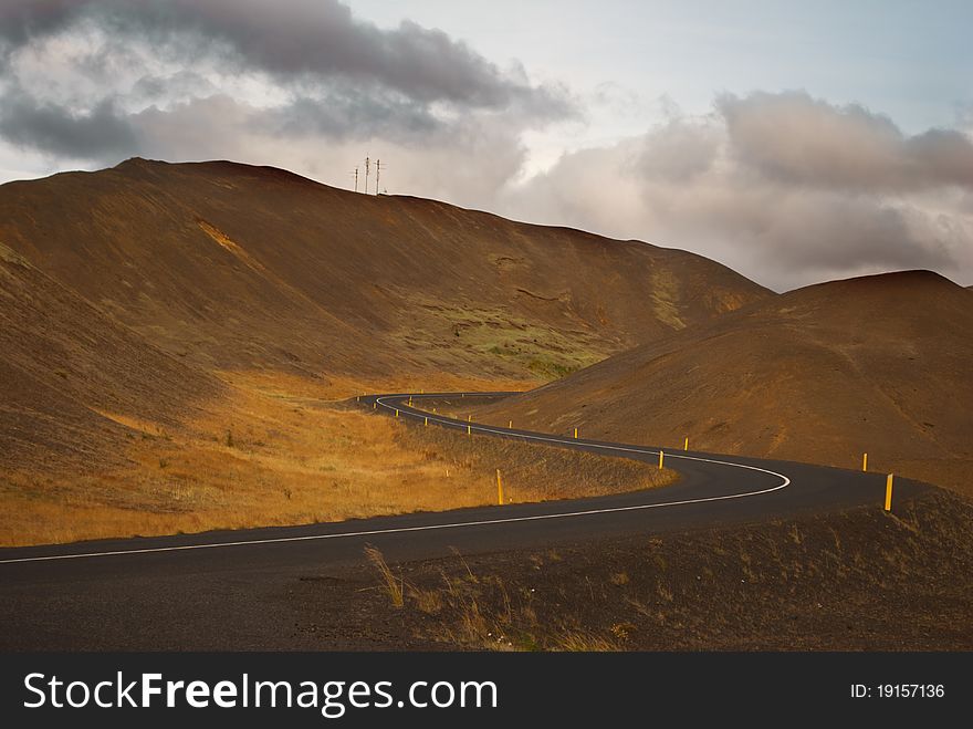 Winding mountain road next to Myvatn in north of Iceland. Winding mountain road next to Myvatn in north of Iceland