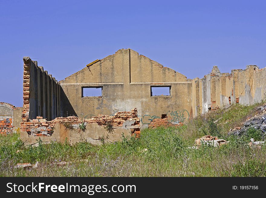 Old house destroyed; demolished building with only to walls