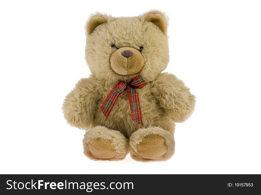 Teddy Bear with red ribbon on white background
