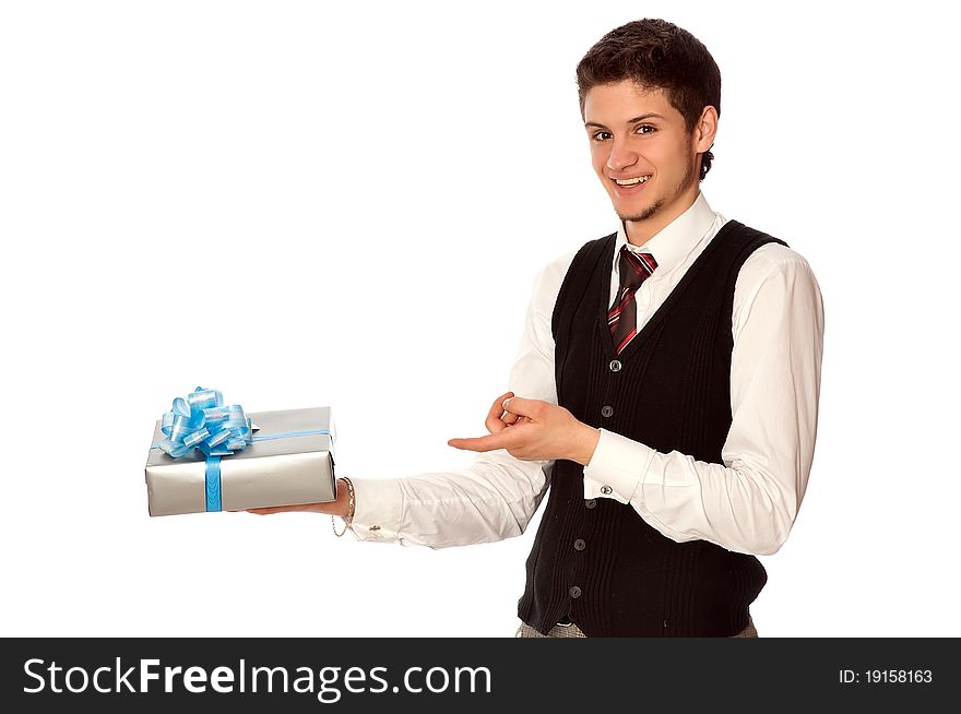 Happy man holding in the hands the gray box with blue ribbon as a gift. Happy man holding in the hands the gray box with blue ribbon as a gift