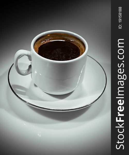 Studio shot
white ceramic cup with coffe
on the abstract dark gradient gray background. Studio shot
white ceramic cup with coffe
on the abstract dark gradient gray background