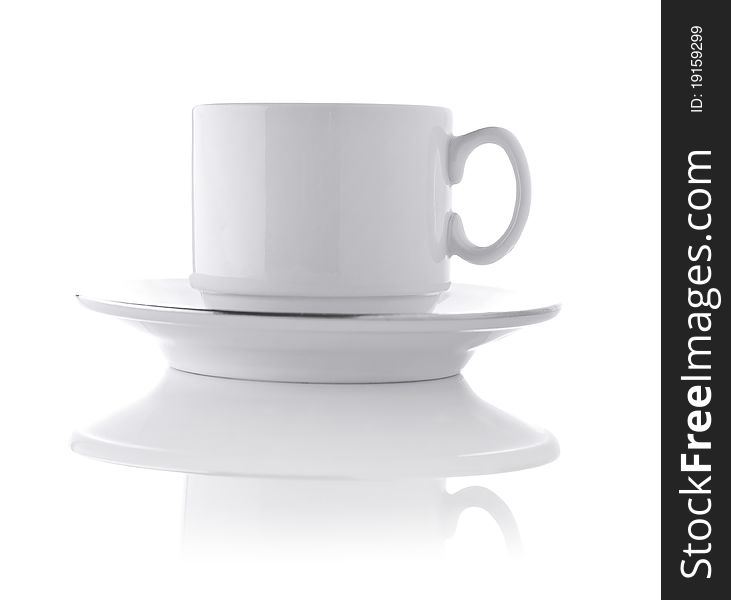 White ceramic cup on saucer isolated on white background