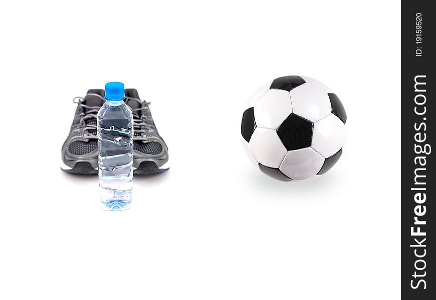 A soccer ball and training gear isolated against a white background