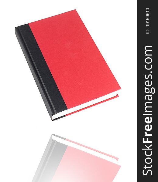 A red book isolated against a white background