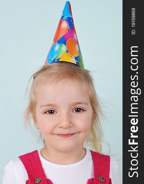 Girl with birthday hat