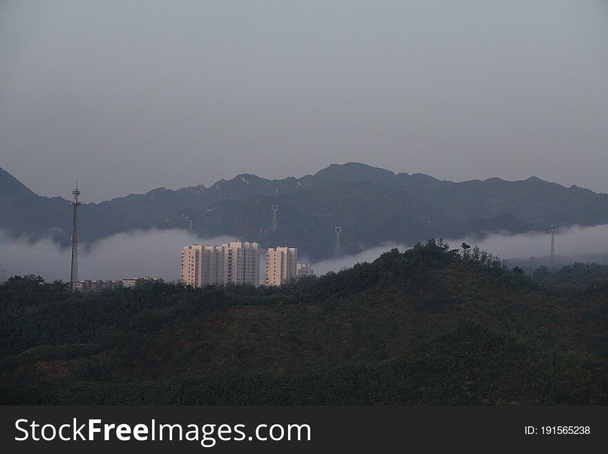 Buildings in the clouds-Xinglong, Hebei Province, June 2020. Buildings in the clouds-Xinglong, Hebei Province, June 2020