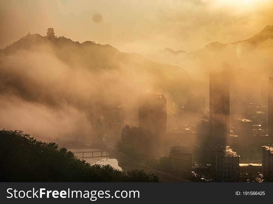 A small town in mountains In the clouds