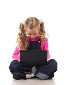 Young Girl With Black Laptop Royalty Free Stock Photography