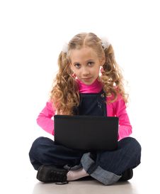 Young Girl With Black Laptop Royalty Free Stock Photography