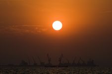 Silouette Of Cargo Ships Stock Photo