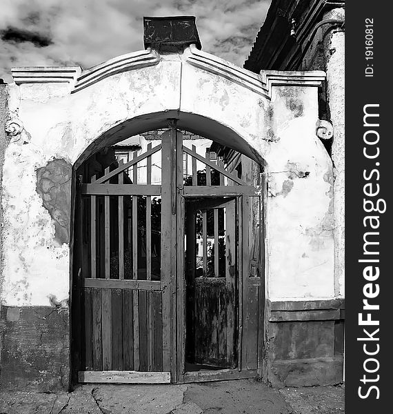 Vintage entrance to an old house. Black and white image