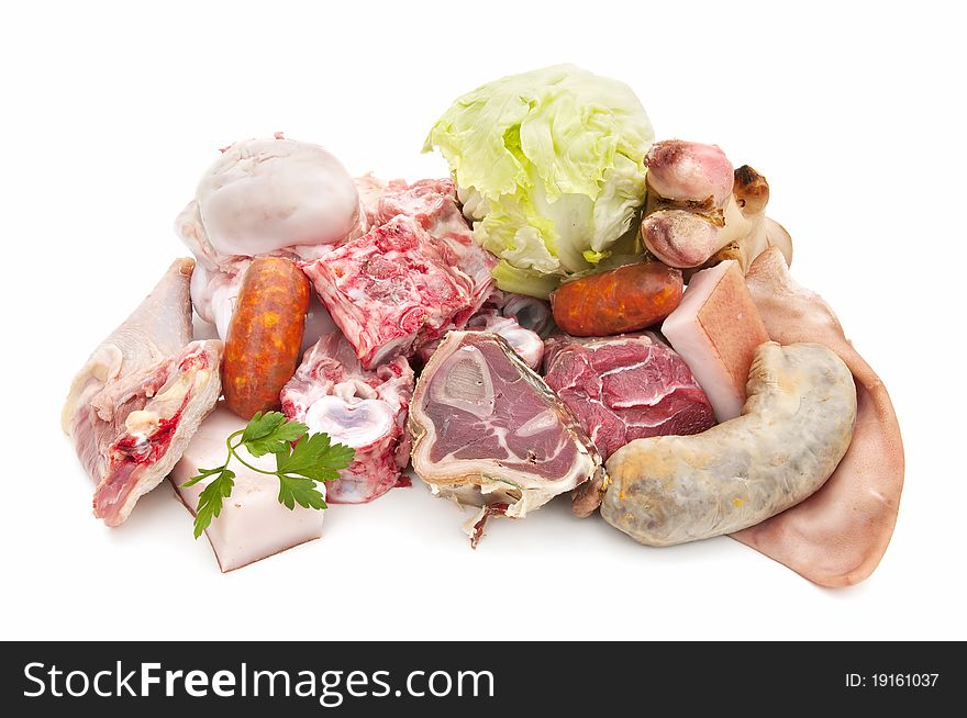 Meat, bones and vegetables isolated on white background. Meat, bones and vegetables isolated on white background