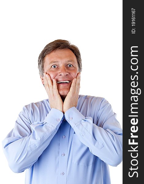 Happy handsome pensionist is surprised about news.Isolated on white background.