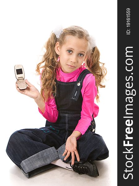 Young beautiful girl showing her new mobile phone. Young beautiful girl showing her new mobile phone.
