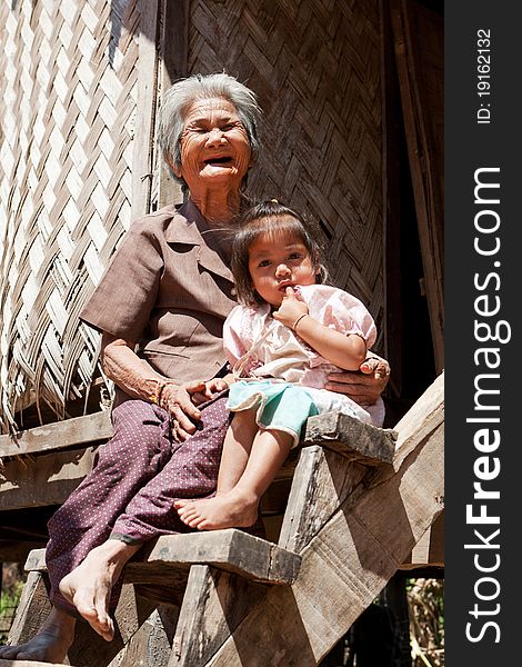 Asian grandmother with granddaughter, portrait of asian people