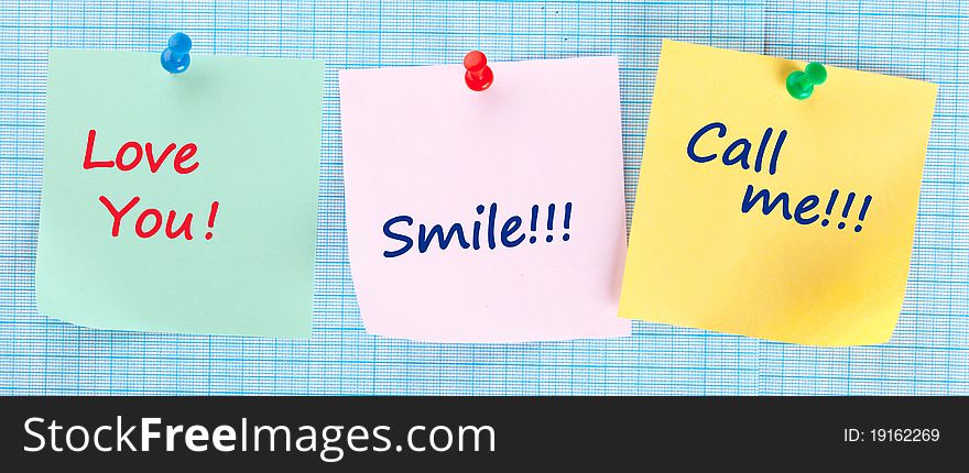 Yellow sticky papers with trendy slogans on the coloured background. Yellow sticky papers with trendy slogans on the coloured background