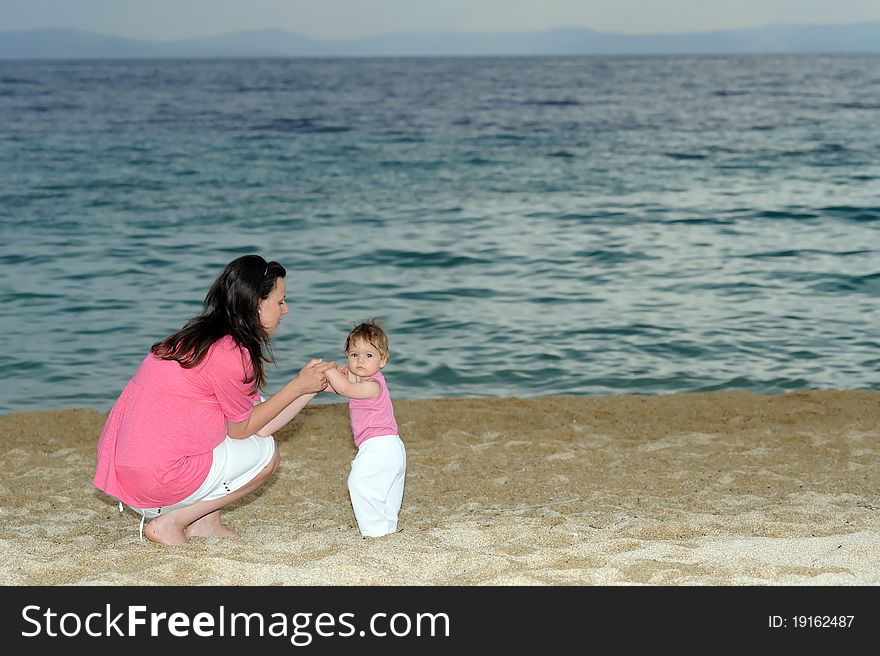 Mother with her baby at beach