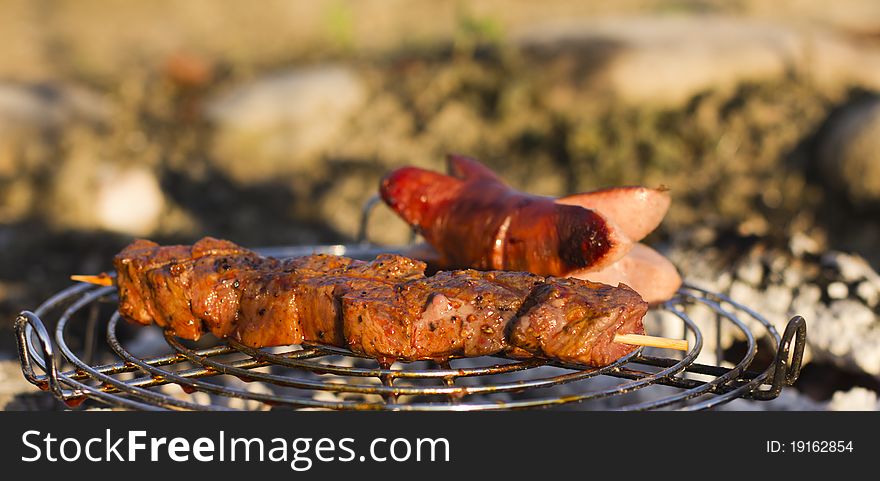 Meat and wurst on the hot grill. Meat and wurst on the hot grill