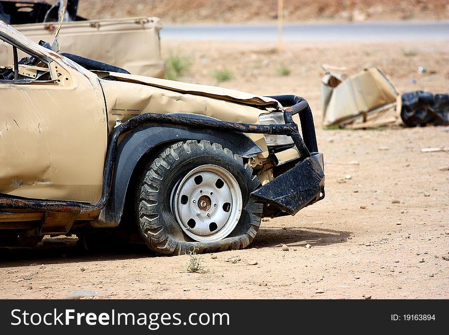 A damaged truck with flat tire outdoor. A damaged truck with flat tire outdoor