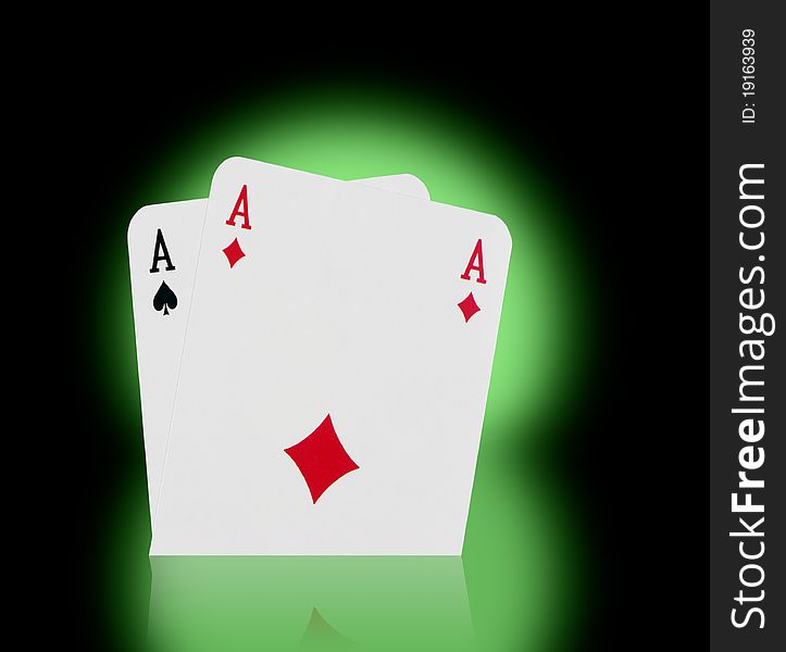 Playing cards on a green background
