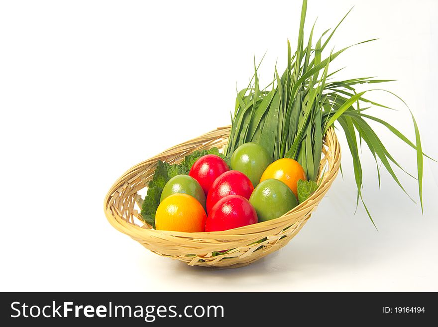 Easter basket, colored eggs with grass. Easter basket, colored eggs with grass