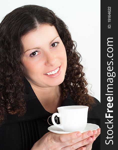 Portrait of a woman with a cup on a white background