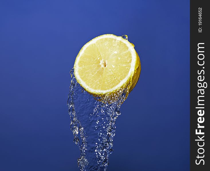Lemon on the blue background