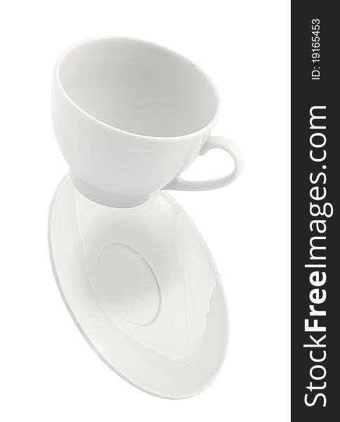 Falling coffee cup and saucer, isolated on white background