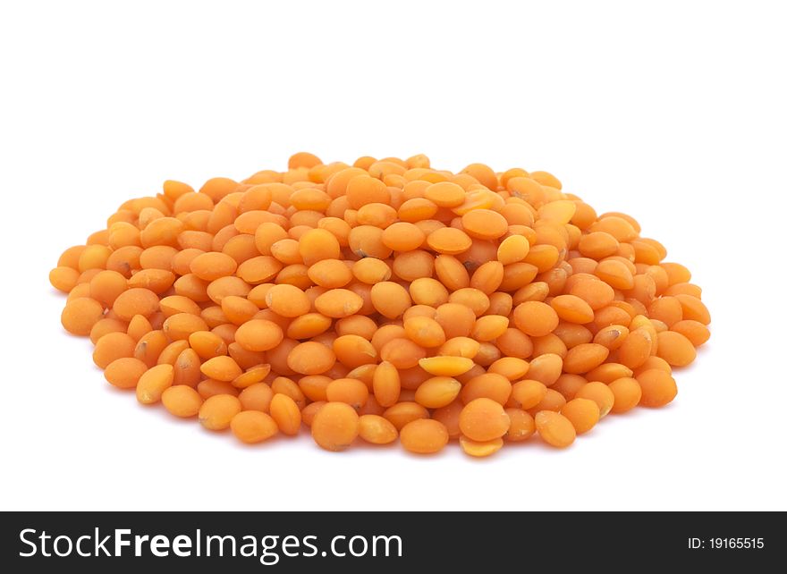 Red lentils isolated on white