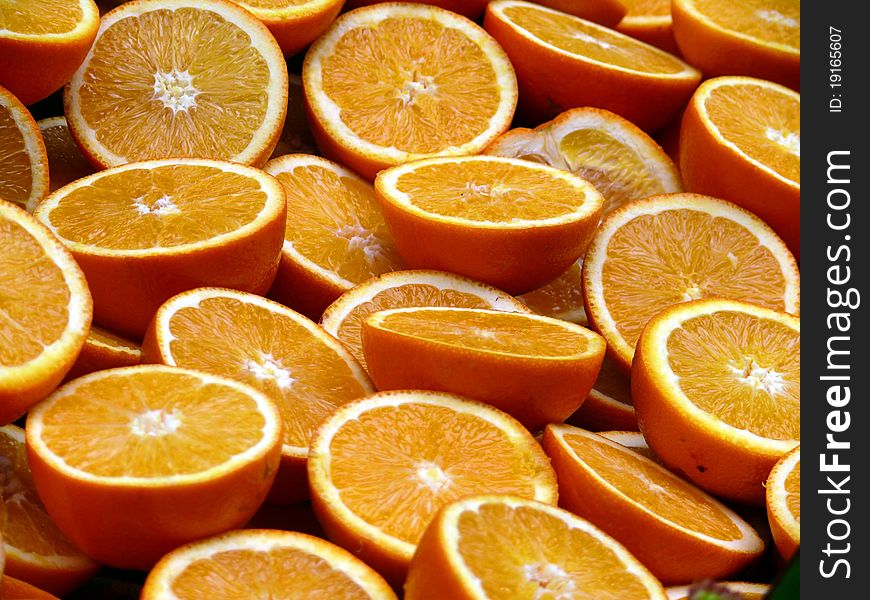Fresh orange backroung. Half of fruit