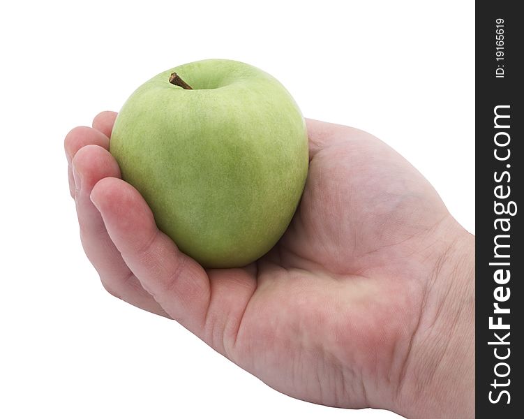 Green apple in hand, isolated on a white background