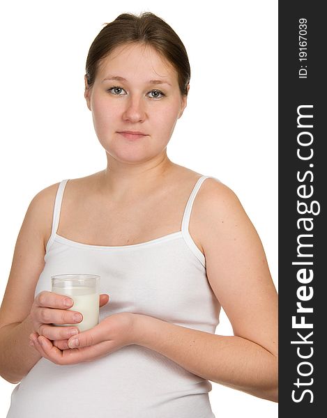 Portrait of pregnant woman with milk over white