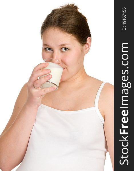 Pregnant woman is drinking milk over white. Pregnant woman is drinking milk over white
