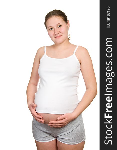 Attractive pregnant woman over white