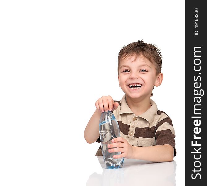 Portrait of a cute boy having a bottle of refreshing water - isolated on white. Portrait of a cute boy having a bottle of refreshing water - isolated on white