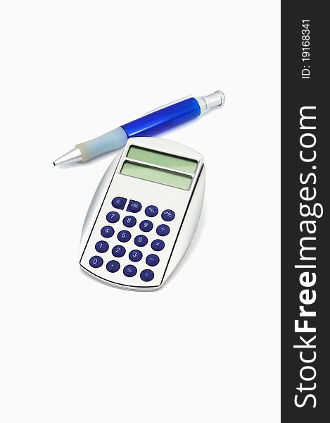A calculator and a ball-pen isolated