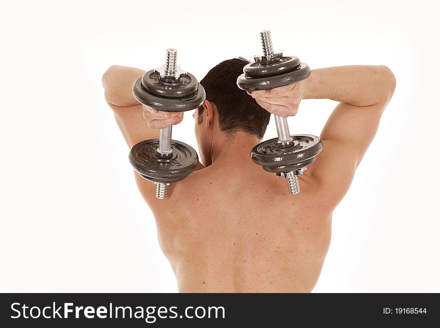 A man is shirtless and holding weights over his back. A man is shirtless and holding weights over his back.