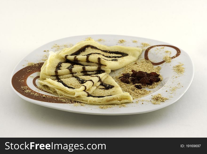 Homemade pancakes with cranberries on white background