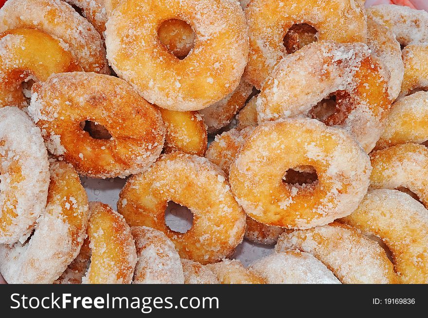 Sweet Potatoes Doughnuts Are Chinese Breakfast Snack. They Are Coated With Powder Sugar
