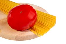 Uncooked Italian Spaghetti With Tomato. Royalty Free Stock Photo Uncooked Italian Spaghetti With Tomato. Royalty Free Stock Photo